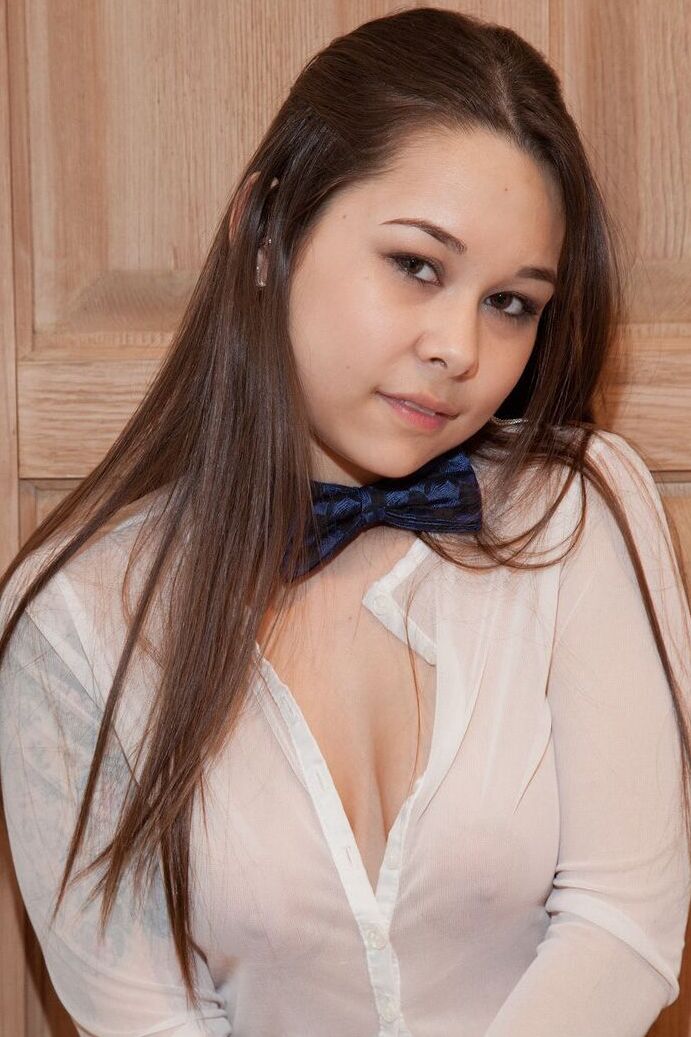 11P Asian American girl models in a see thru shirts and over the knee socks