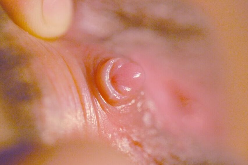 21P Pretty eyed Melia shows her clit close up before sticking a dildo in her muff