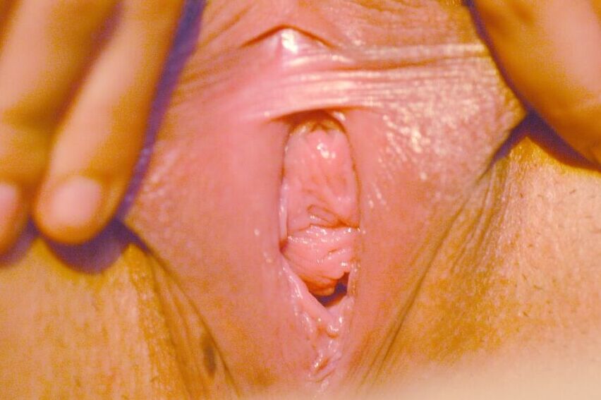 21P Pretty eyed Melia shows her clit close up before sticking a dildo in her muff