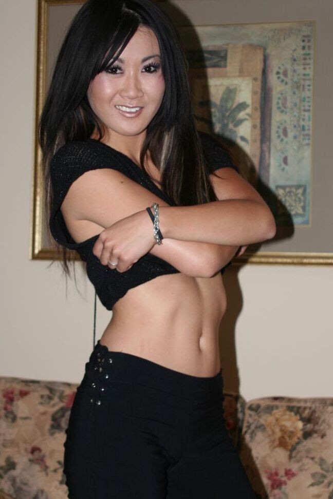 16P Asian first timer Taya parts her pink pussy with manicured nails on a couch