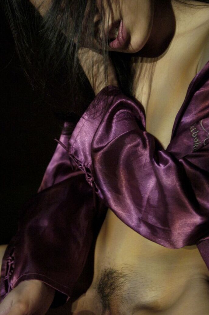 16P The beautiful Asian is having fun with a nice little purple dildo