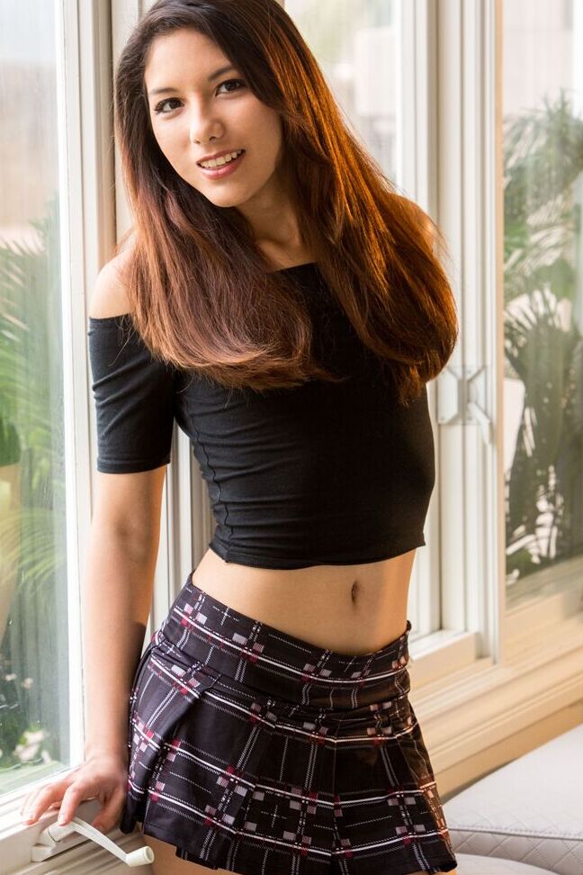 15P Asian model Melody Wylde gets completely naked afore a window