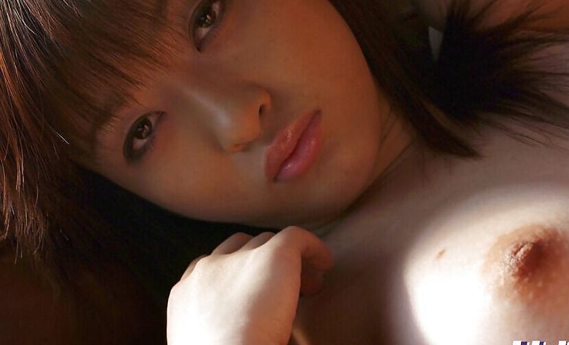 16P Asian babe Sakura Shiratori uncovering her big melons and unshaven pussy