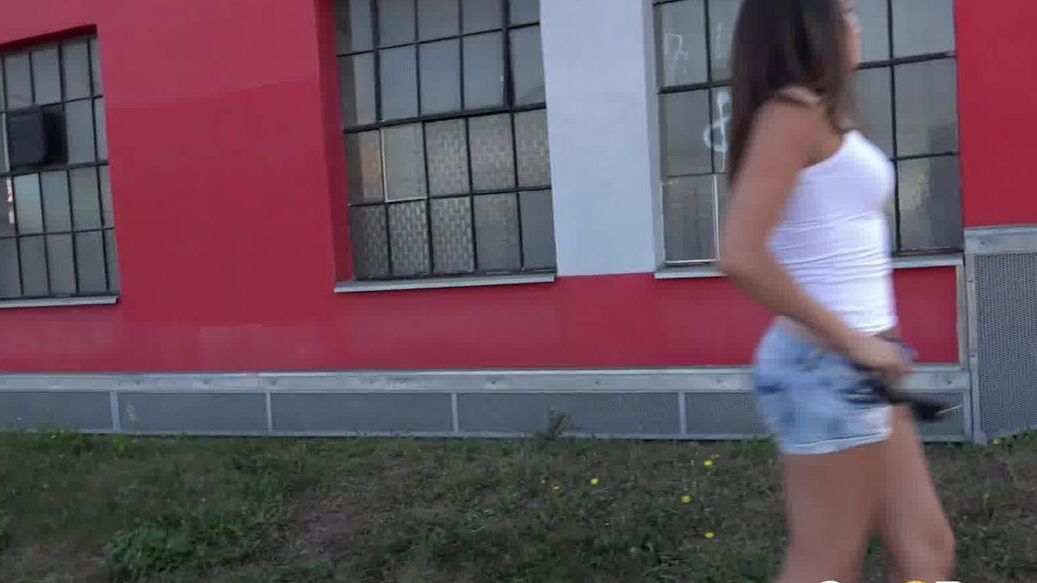 15P Caucasian chick Yenna pulls down her shorts to piss next to a public sidewalk