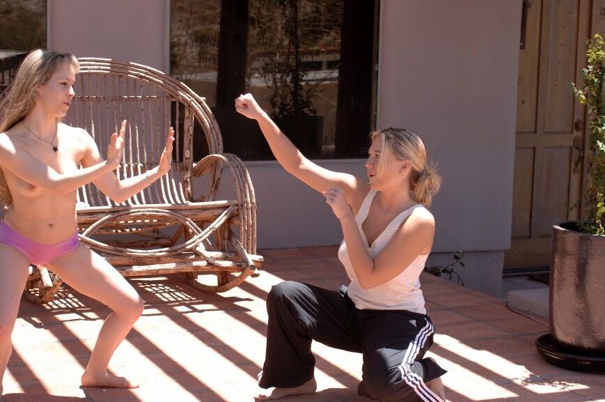 15P Tiny blonde is picked up off the ground by a blonde girl after a karate fight
