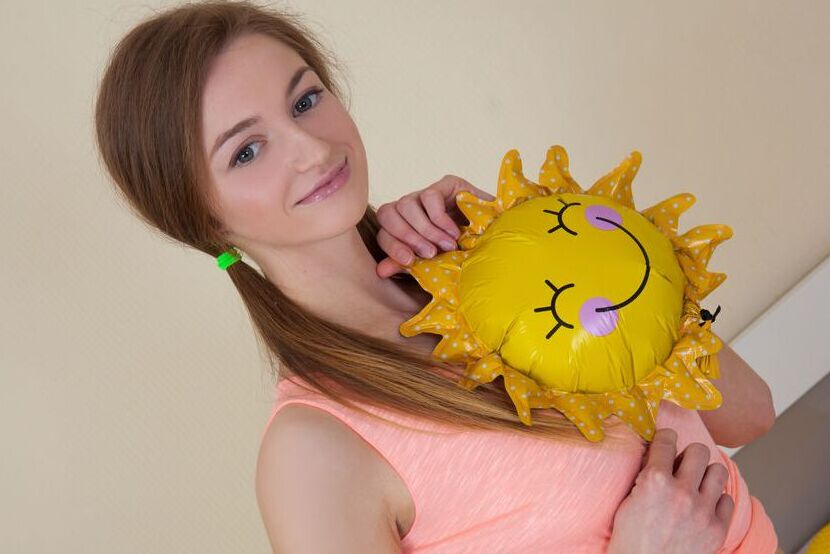 20P This teen hottie celebrates a special occasion with stripping some clothes and