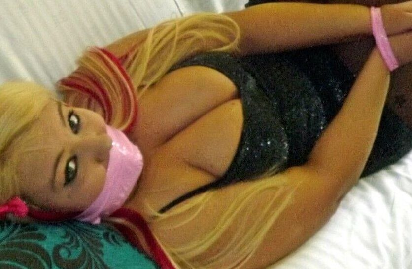 16P Blonde fatty is gagged with her wrists and ankles tied up