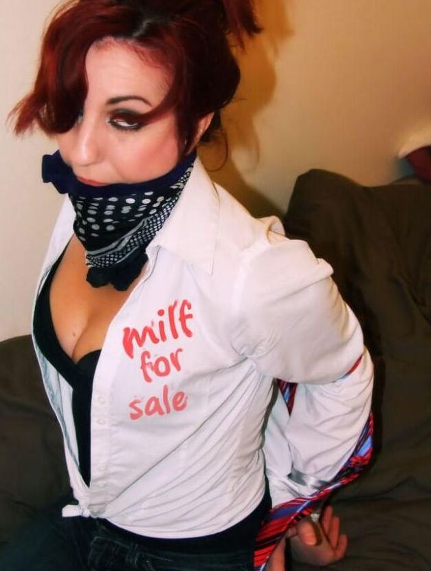 16P Redhead female spends her days gagged and bound in one way or another