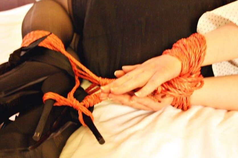 16P Natural redhead ends up cleave gagged while hogtied in her clothes on a bed