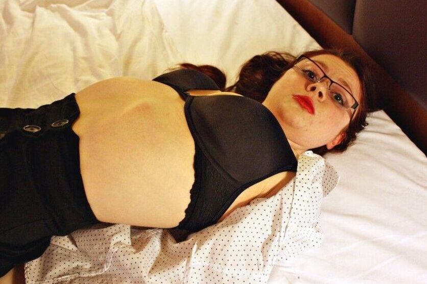 16P Natural redhead ends up cleave gagged while hogtied in her clothes on a bed
