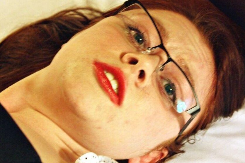 16P Natural redhead ends up cleave gagged while hogtied in her clothes on a bed