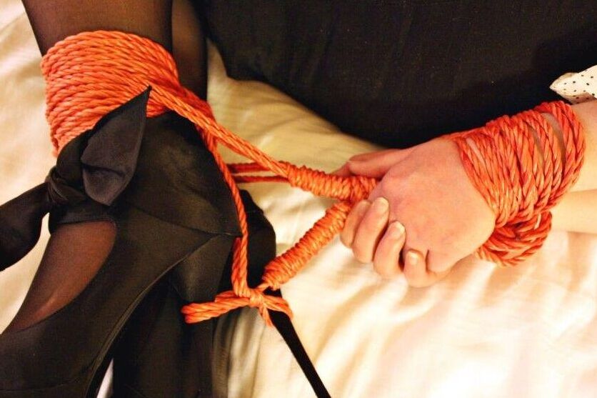 16P Natural redhead ends up cleave gagged while hogtied in her clothes on a bed