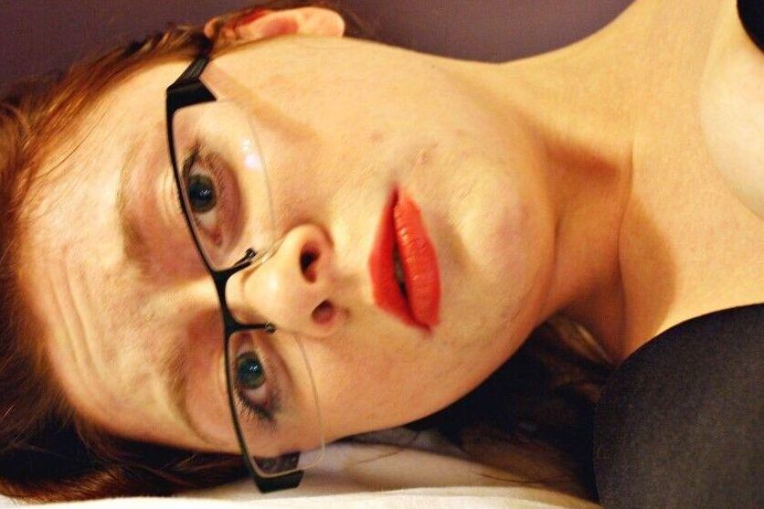 16P Natural redhead ends up cleave gagged while hogtied in her clothes on a bed