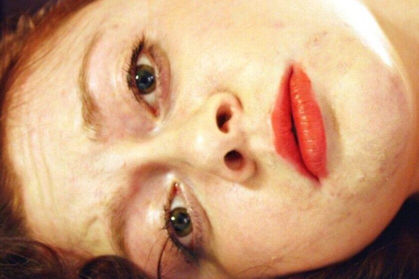 16P Natural redhead ends up cleave gagged while hogtied in her clothes on a bed