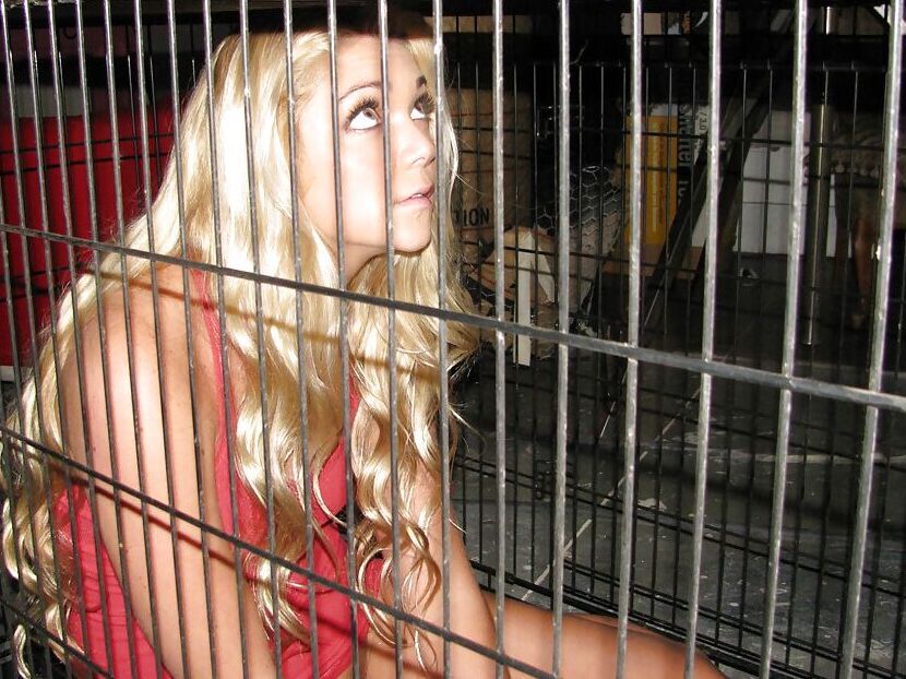 15P Amateur babe Jessie Andrews is imprisoned in her socks, in a cage