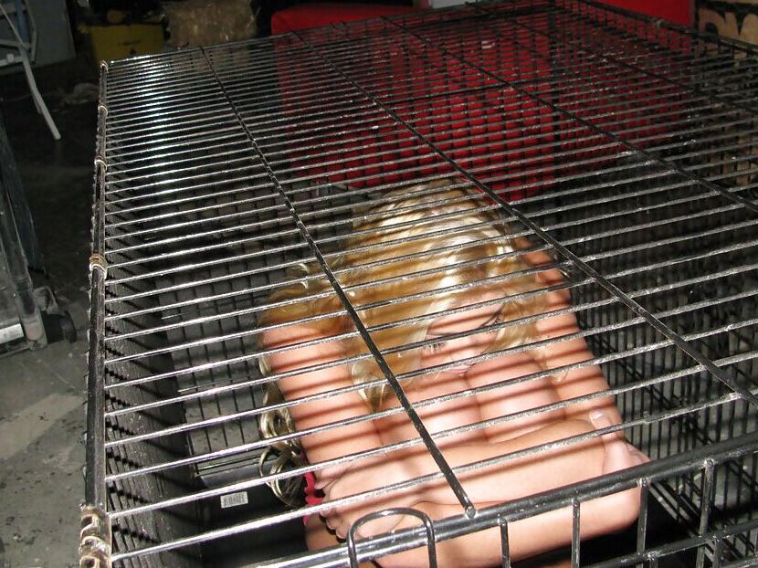 15P Amateur babe Jessie Andrews is imprisoned in her socks, in a cage