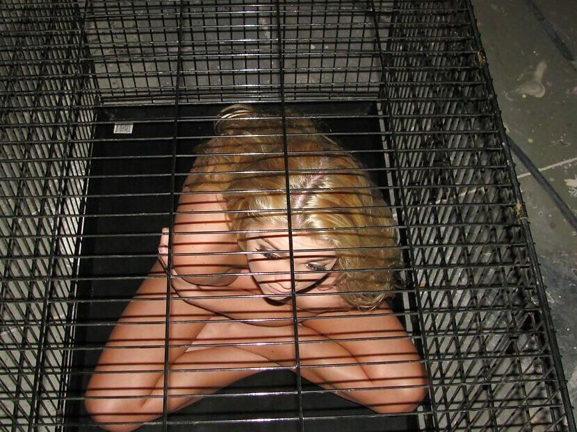 15P Amateur babe Jessie Andrews is imprisoned in her socks, in a cage