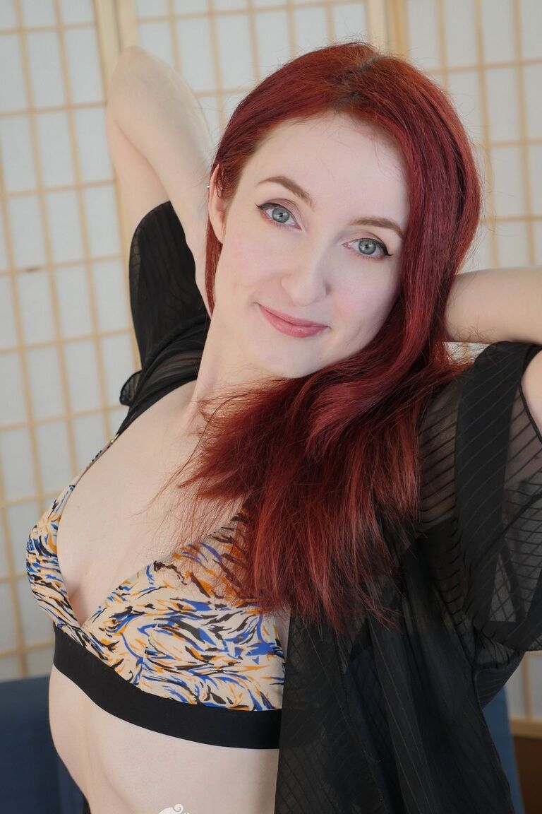 17P Skinny redhead Penny Lay makes her vagina soaked wet with fingers