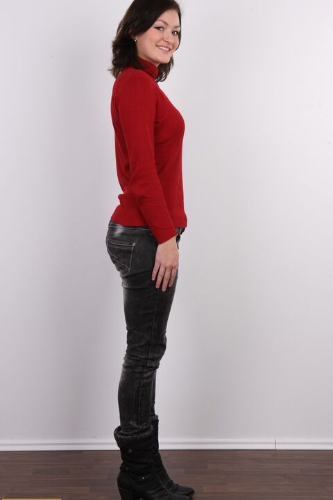 20P First timer Nela models leather pants and a sweater before standing naked