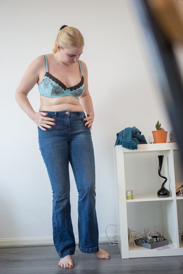 16P Chubby chick Ilse pulls on her underwear and jeans while spy cam is rolling