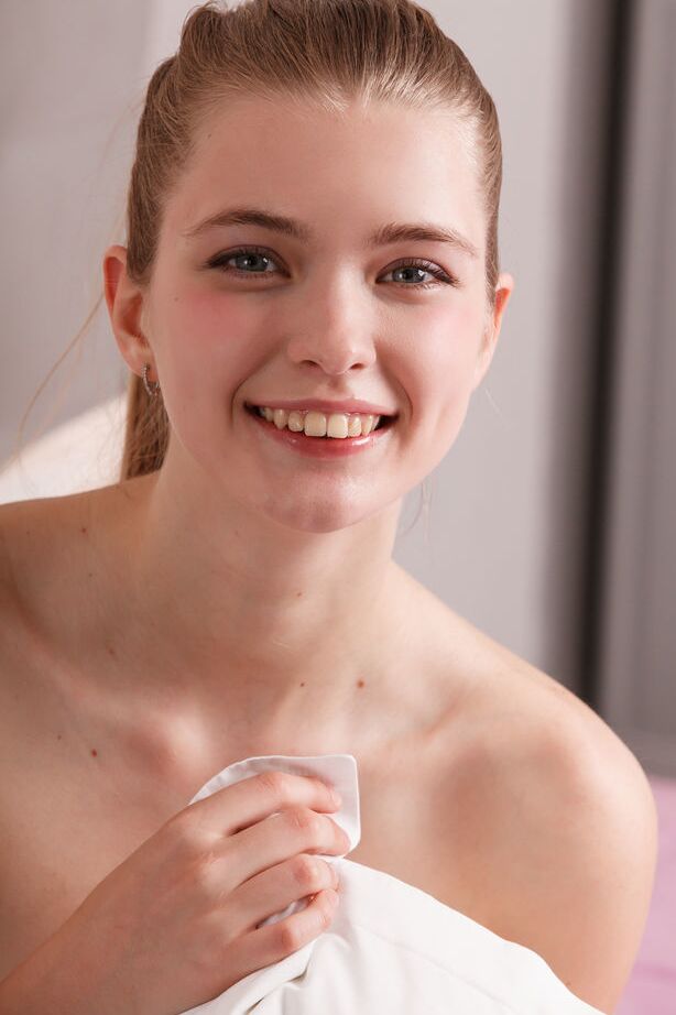 18P Pale redhead Sigrid displays her yummy pussy while modeling in the nude