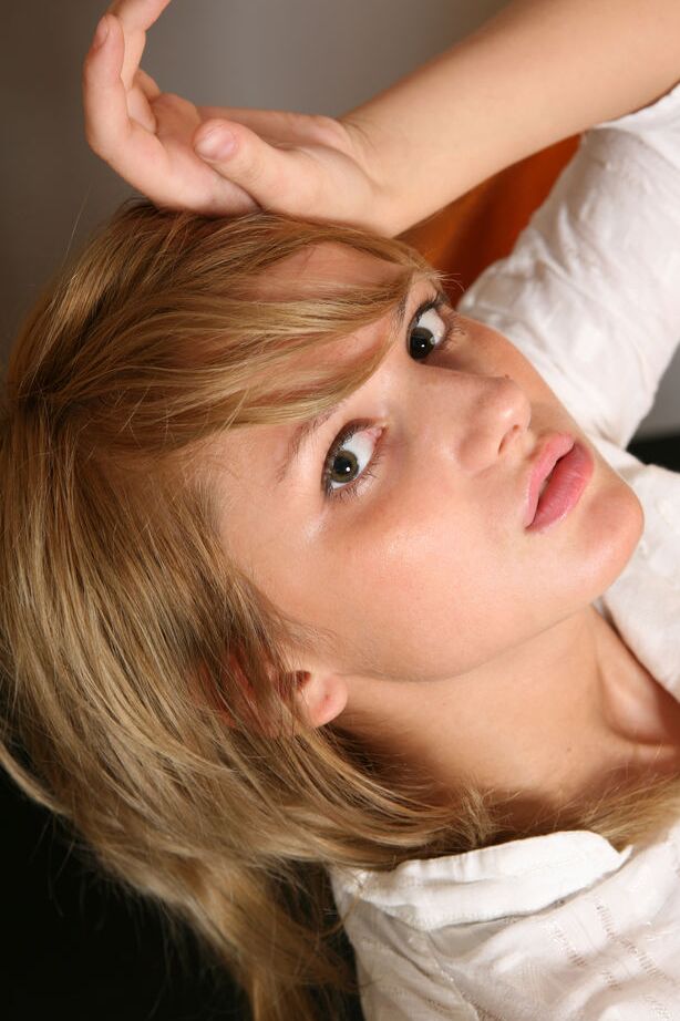 16P Alluring blonde teen Erica gets totally naked in a tempting fashion