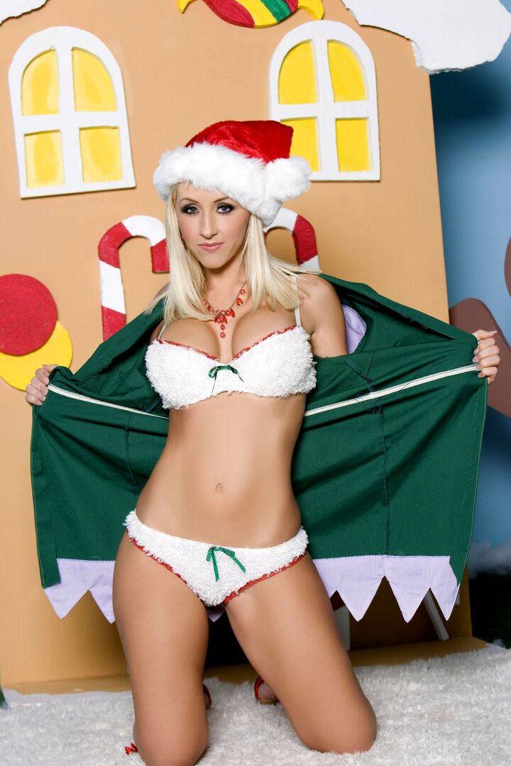 13P Cute blonde Jessica Lynn poses for a centerfold spread with an Xmas theme
