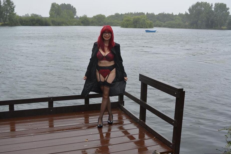15P Mature redhead Barby Slut gets naked in public places on a wet day