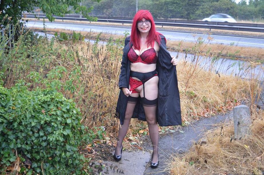 15P Mature redhead Barby Slut gets naked in public places on a wet day