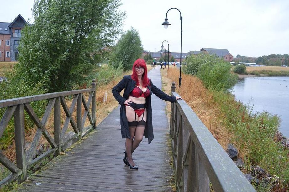 15P Mature redhead Barby Slut gets naked in public places on a wet day