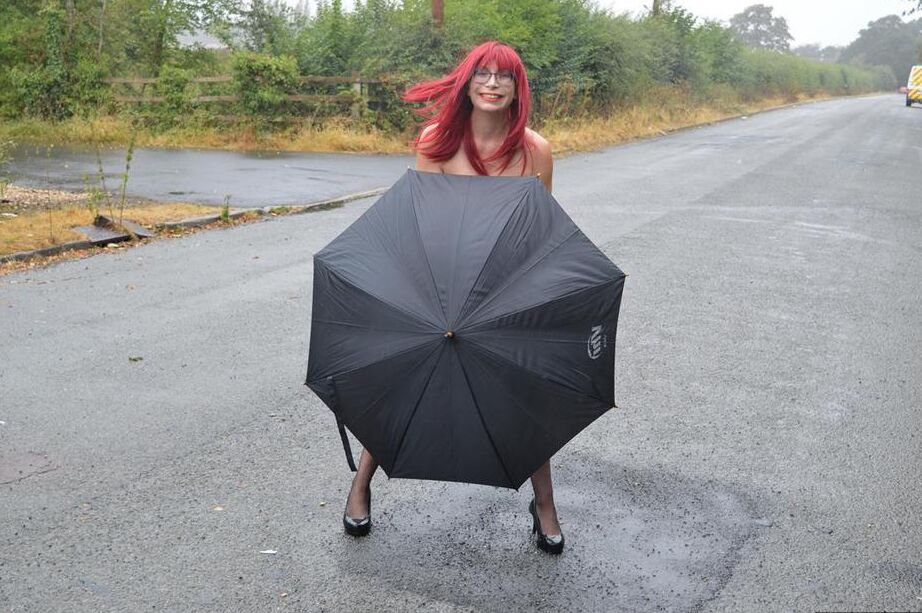 15P Mature redhead Barby Slut gets naked in public places on a wet day