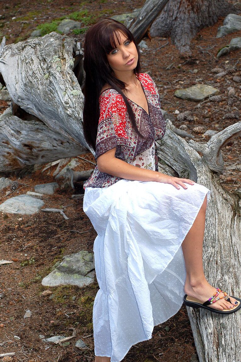 12P Young first timer Chrissy gets completely naked while in a forest setting