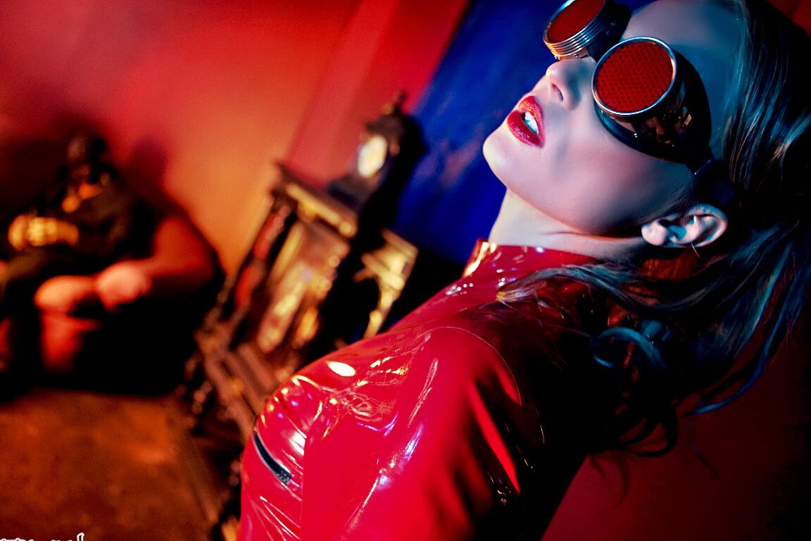 15P Hot MILF Diana Doll unzips latex bodysuit to ride a latex clad man's hard dick