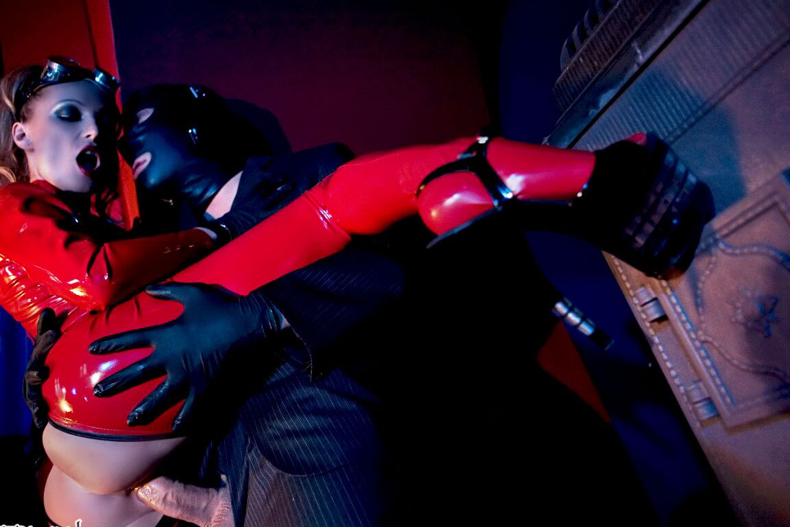 15P Hot MILF Diana Doll unzips latex bodysuit to ride a latex clad man's hard dick