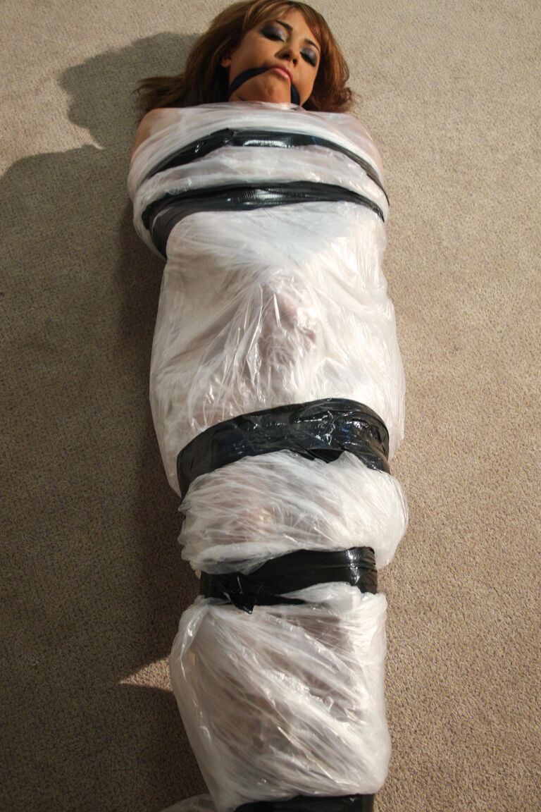19P Poor slut Kayla moans while being covered in special plastic film