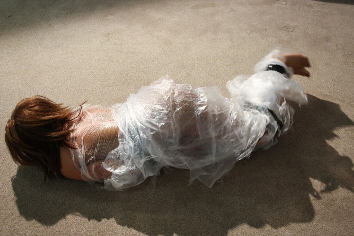 19P Poor slut Kayla moans while being covered in special plastic film