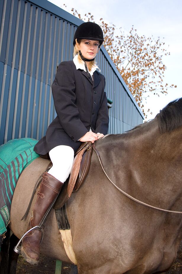 13P Sexy equestrian Laurita strips riding clothes in the tack room to spread ass
