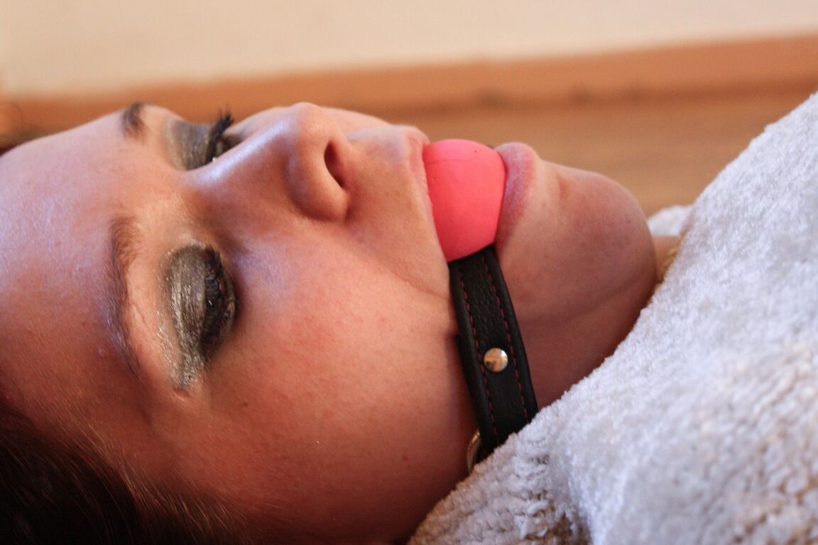 17P Tied up and ball gagged female is subjected to forced masturbation