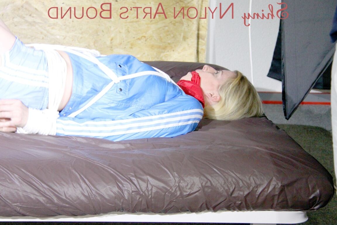 16P HOT HOT HOT PIA being tied and gagged on a sofa with ropes and a cloth gag