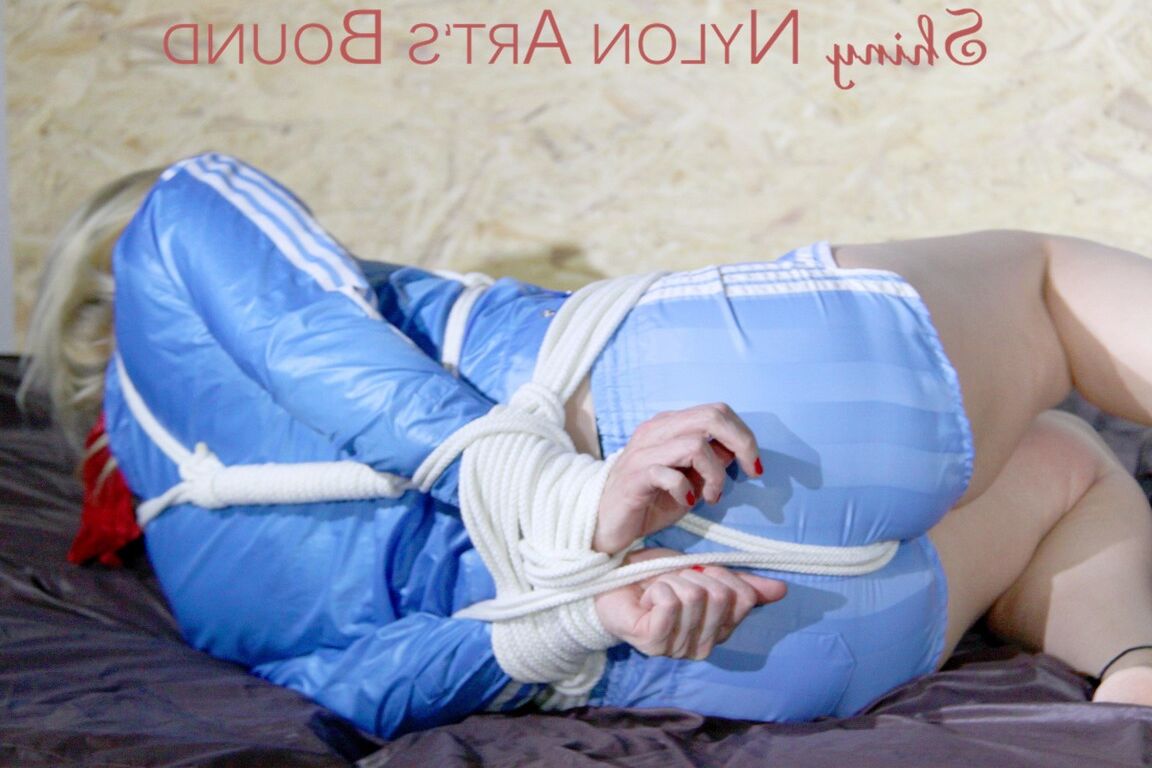 16P HOT HOT HOT PIA being tied and gagged on a sofa with ropes and a cloth gag