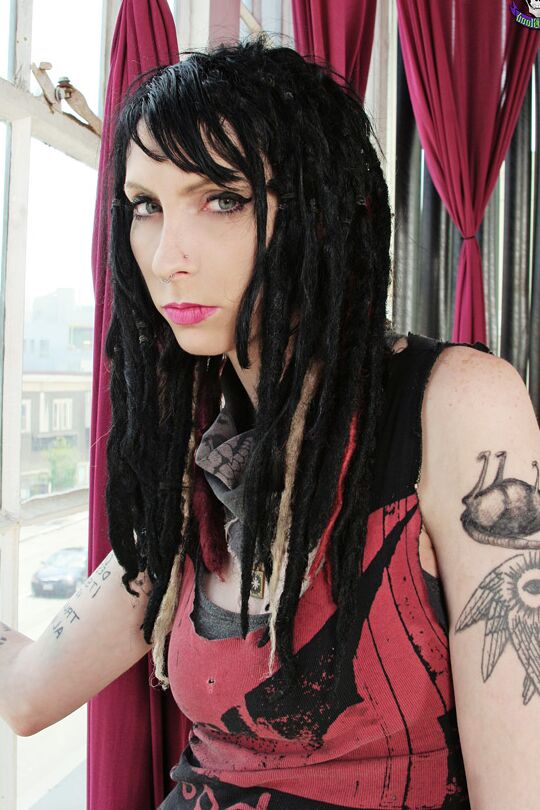 15P Goth girl Stephanie Slaughter peels off what little clothes she wears