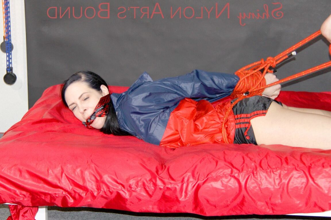 16P HOT DESTINY tied and gagged with ropes and a cloth gag on bed wearing a sexy
