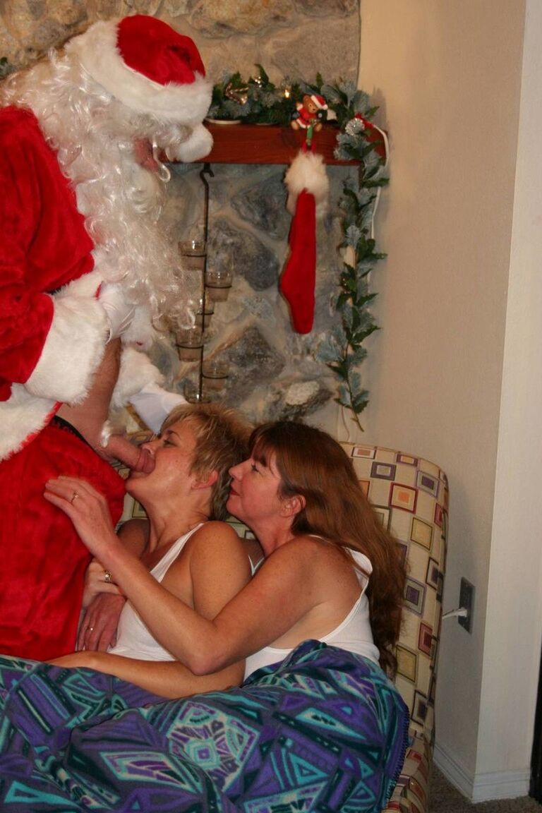 21P Mature sluts enjoying a sizzling FFM threesome with a Naughty Santa on Xmas