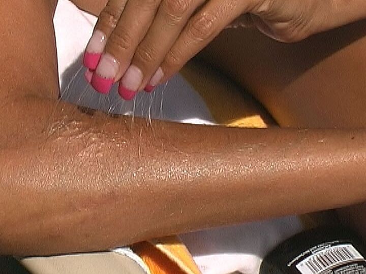 21P Beautiful tanned Lori Anderson teases with her hairy arms while sunbathing