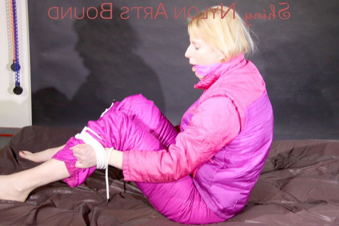 16P PIA tied and gagged with ropes on the sofa wearing a supersexy oldschool down