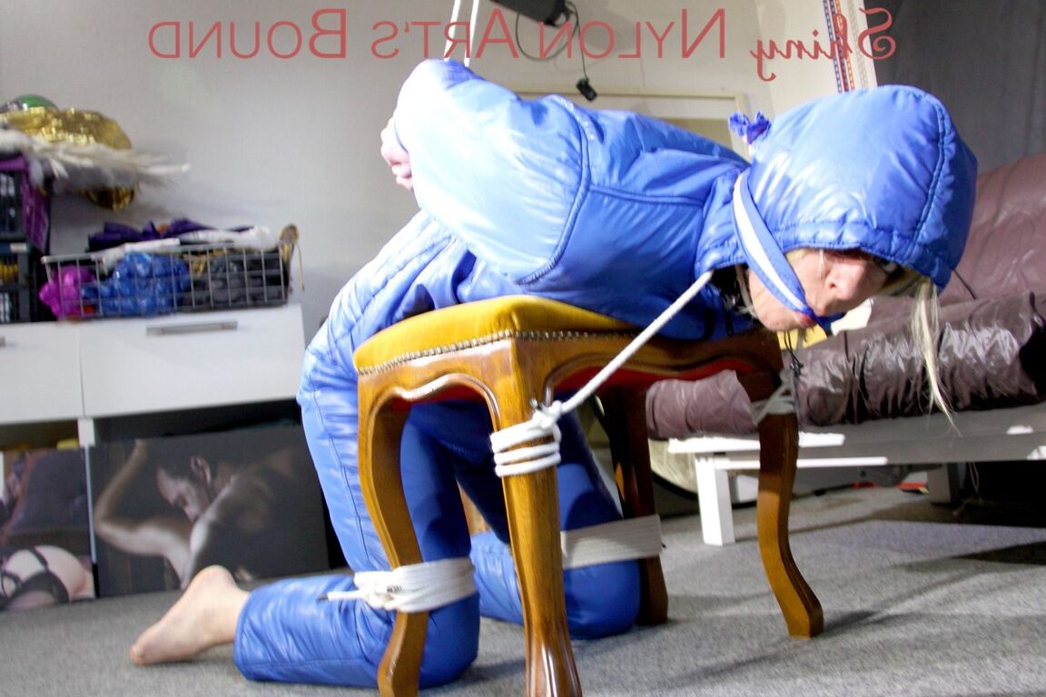 16P PIA tied, gagged and hooded on a stool and on the ceiling wearing a supersecy