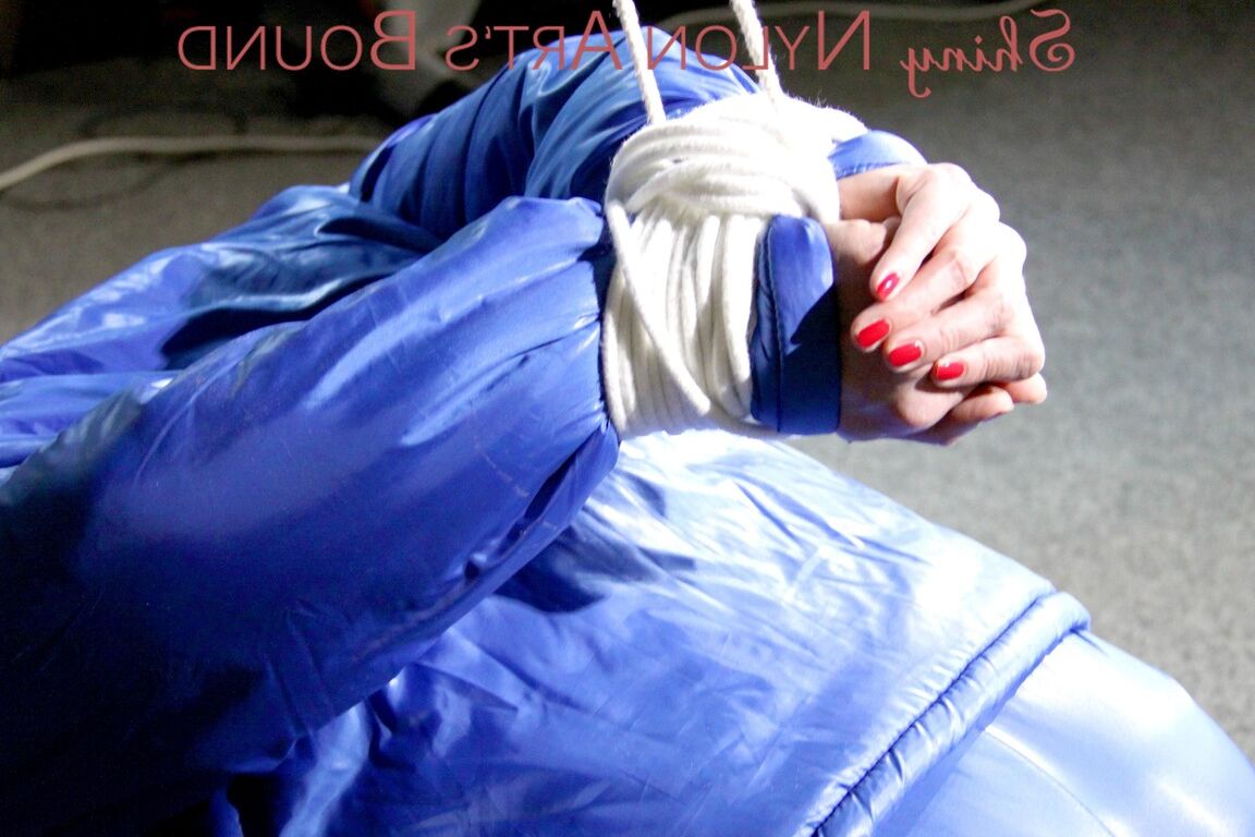 16P PIA tied, gagged and hooded on a stool and on the ceiling wearing a supersecy