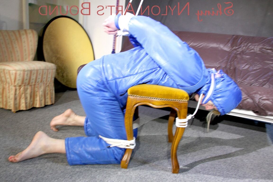 16P PIA tied, gagged and hooded on a stool and on the ceiling wearing a supersecy