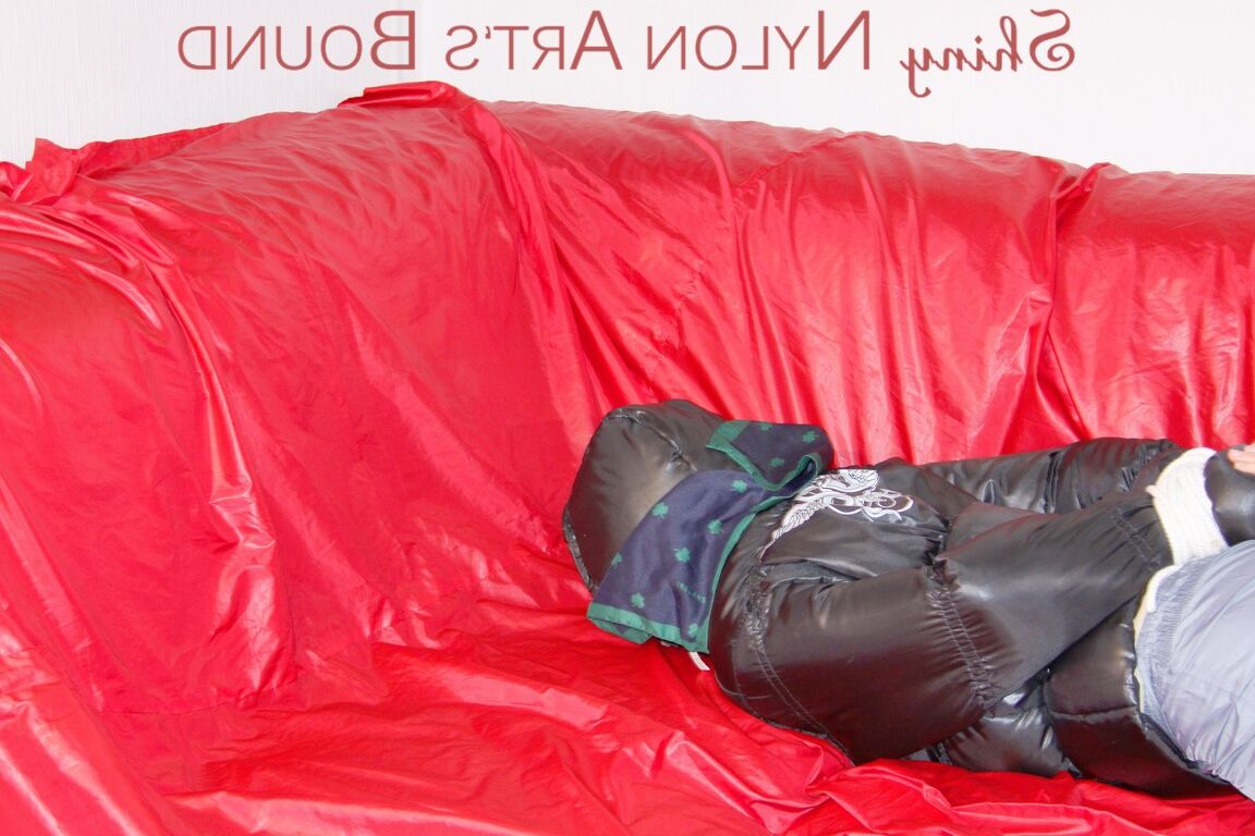 16P Sonja tied and gagged with ropes and a ball gag wearing a sexy grey shiny