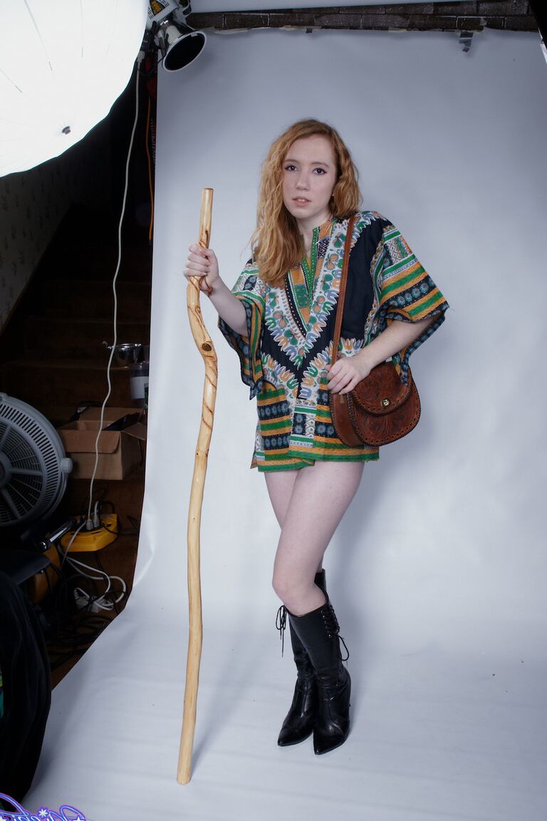 15P Natural redhead Nicki Blue pulls down her black panties during a solo shoot
